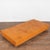 This fun mid-century find originally served as a daybed in Denmark. The original camel colored leather has buttons along...