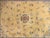 A rare and exquisite early 20th-century Chinese Peking rug, distinguished by its luminous gold fielda sought-after hue...