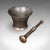 This is an antique chemist's counter mortar and pestle. An English, bronze apothecary aid, dating to the Georgian period,...
