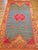 This vintage Moroccan area rug from the third quarter of the 20th century achieves a rare and beautiful balance of...