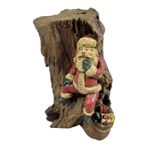 Vintage Christmas Santa Claus in Tree Trunk Figurine