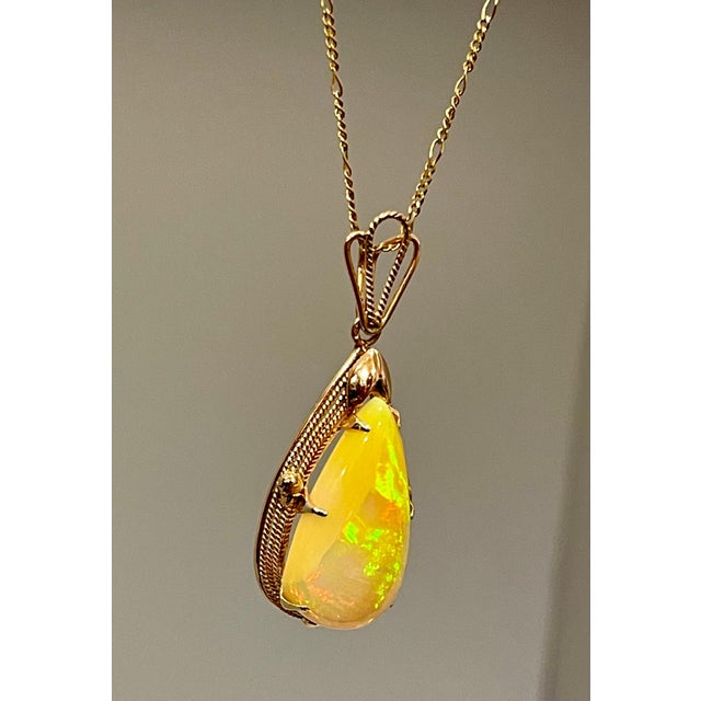18 Carat Pear Ethiopian Opal Pendant / Necklace 14 Karat Yellow Gold Estate For Sale - Image 12 of 18