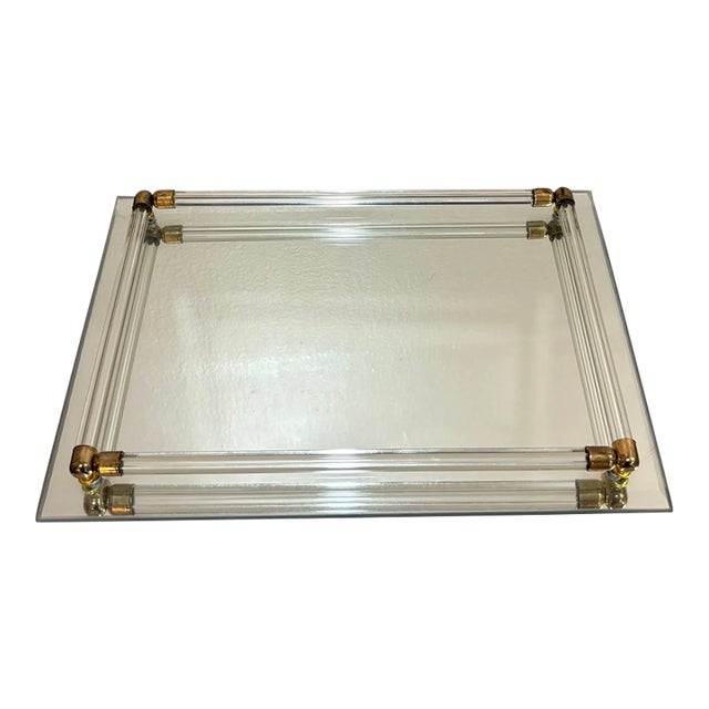 1970s-80s mirrored tray w/ lucite bar border and brass corner accents. Excellent condition.