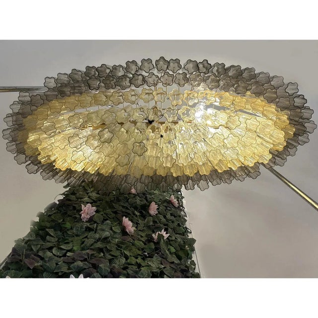 Scenographic italian hand-made chandelier with multicolored "tronchi", elements of murano glass. huge chandelier in a bath...