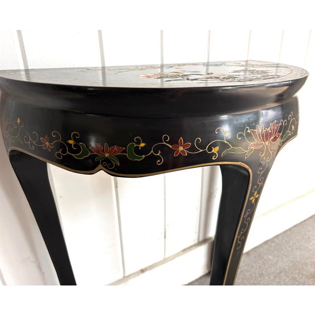 1960s-70s black lacquered bird/flower demilune table. Excellent condition.