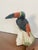 Impressive multi semiprecious stone carving toucan bird figurine on white marble stone pedestal.