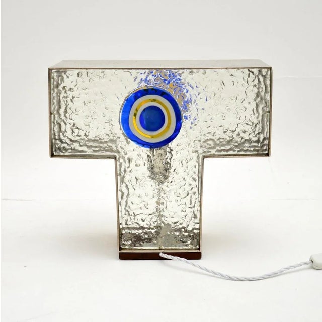 A stylish and quirky vintage italian glass and steel table lamp, thought to be designed by angelo brotto for esperia...