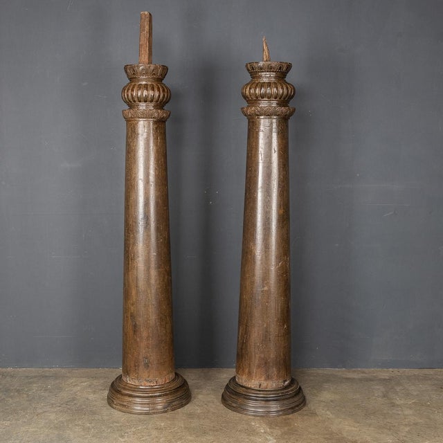 Antique mid-19th Century Indian pair of hard wood, hand carved architectural columns. Height: 163cm Base Diameter: 42cm