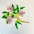 This is a Mid-Century decorative wall sculptural object. It features an acrylic and Lucite tree branch of cherry blossoms....
