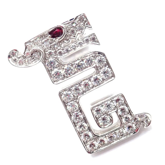 Cartier Le Baiser Du Dragon 18k White Gold Diamond Ruby Pin Clip Metal: 18k White Gold Measurements: 23mm x 15.5mm Weight:...