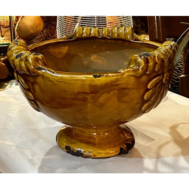 Large Round Vintage Weathered Vase on Pedestal Base. Heavy centerpiece with a rolled design at the top with large engraved...