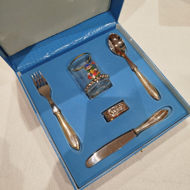Silver Set of Cutlery (Fork, Knife, Spoon, Napkin Ring and Cup). 214 grams. Height: 8.67 in (22 cm) Width: 8.27 in (21 cm)...