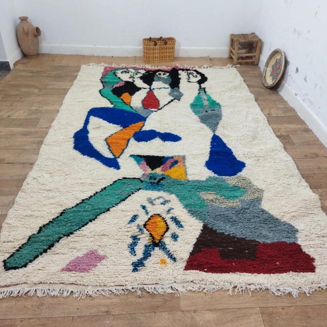 A Moroccan Berber Textile Artwork With Abstract Figurative Design This exceptional Moroccan Berber textile features a bold...