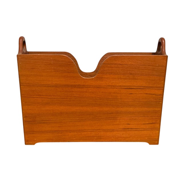 Near mint condition- made from beautiful teak wood. Easily tucked away with its slender design. Unmarked.