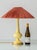 A butter-yellow, high-gloss ceramic lamp of the type collectors call Casa Pupo — after the Pimlico Road shop opened in...