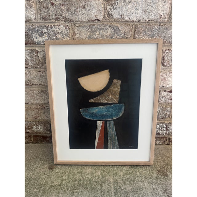 Artwork by Kimberly Moore, signed, in a custom light oak frame with UV glass. This abstract collage is neutral overall but...