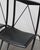 2 pairs available (4 chairs total). price is per pair. pair of 2 black folding chairs by the italian brand cattelan...