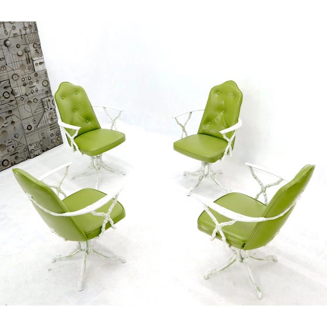 Mid-Century Modern quality cast aluminum dining set consisting of 4 chairs and rectangular glass top table. Good quality...