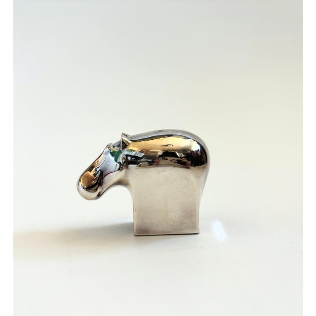 A vintage silver plated abstract figurine of a hippo. Designed by Gunner Cyren for Dansk in the 1970s. Nice heavy weight...