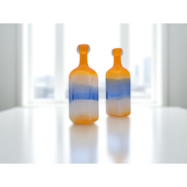 Add a pop of color to your space with this charming pair of 1980s-style decorative bottles. These pieces, with their...