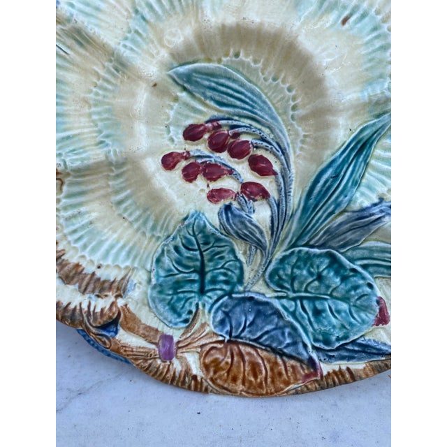 19th-Century Majolica oyster plate Wasmuel (Belgium) decorated with flowers.
