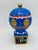 Charming vintage hand-painted ceramic Paris hot air balloon jar featuring a rich cobalt blue glaze with gilt accents,...