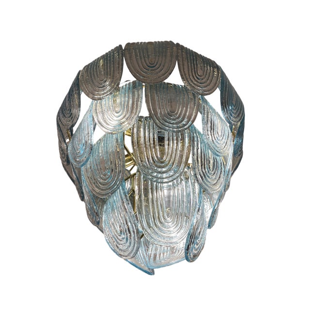 Ceiling lamp with a gilded brass ring structure. It is composed of Murano glass lobes, each individually handcrafted by...