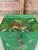 A one-of-a-kind custom painted and decoupaged tropical vintage cabinet featuring an extraordinary collection of jungle-...