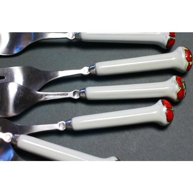 Individually sold. Wonderful design of flatware with a ceramic handle in white, orange red, and brown. Mushroomed at the...