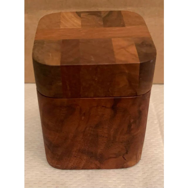 1980s Vintage small box container with rounded square geometrical inlay patterned lid. Possibly burl wood.