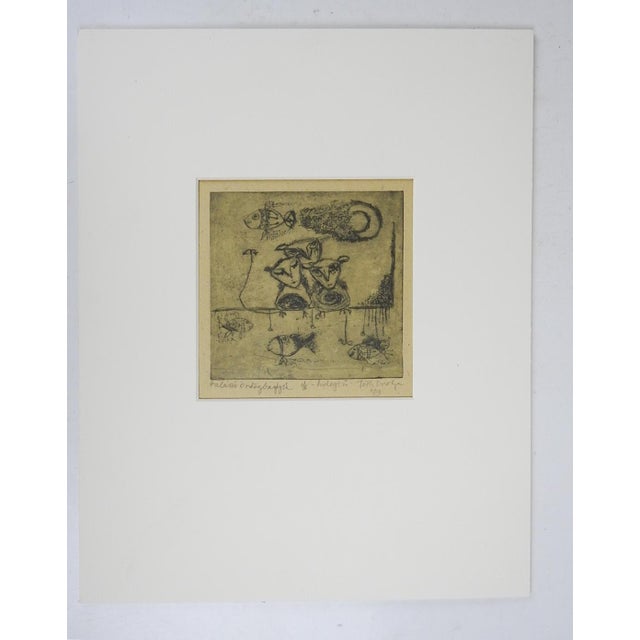 Vintage late 20th century etching on khaki colored paper of abstract creatures and fish. Signed illegibly, numbered 1/6...