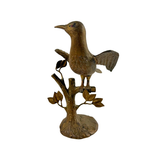 This is a mid 20th Century Italian cast brass sculpture depicting a bird perched on a naturalistic tree branch. The bird...
