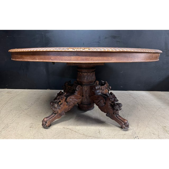 A larger than usual French Carved Oak Hunting Table. These were used to toast the hunt and they pull out and extend with...