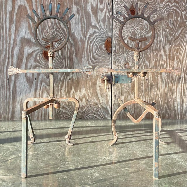 A fantastic pair of vintage Boho metal andirons. A chic brutalist composition of a male and female. Thr most beautiful...