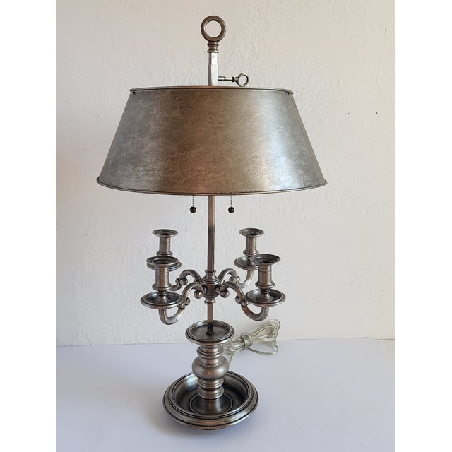 Traditional style bouillote table or desk lamp design by Sandy Chapman. The lamp features a distressed antique nickel...