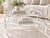 Striking clear lucite coffee table featuring a sculptural waterfall-style silhouette with softly curved corners and a...