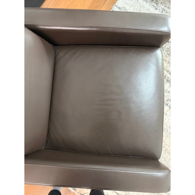 Authentic design within reach flight recliner by Jeffrey Burnett, enrich espresso/top leather with brushed stainless steel...