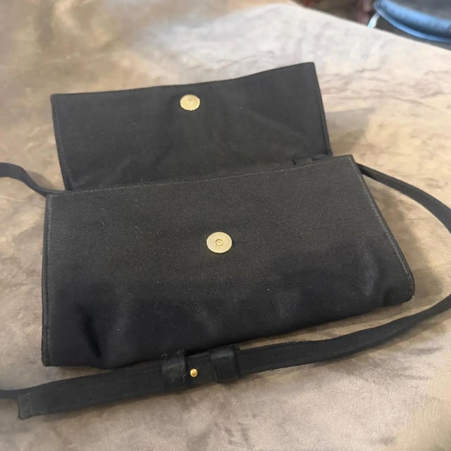 This exquisite 1980s vintage evening bag from the Yves Saint Laurent Rive Gauche collection represents the pinnacle of...