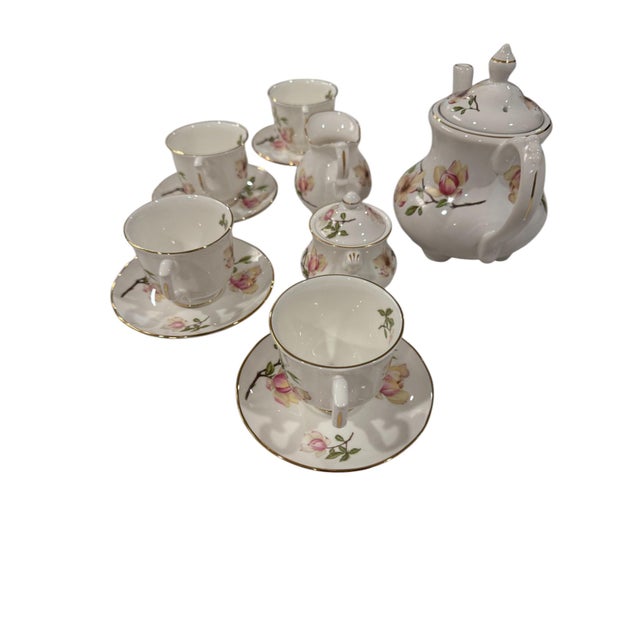 Quick Hits: Made in England by Staffordshire potteries Mid-20th century fine bone china tea set Features delicate rose...