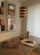 Alternating rings of brushed aluminium and lacquered black metal, stacked in a precise ascending sequence — when the...