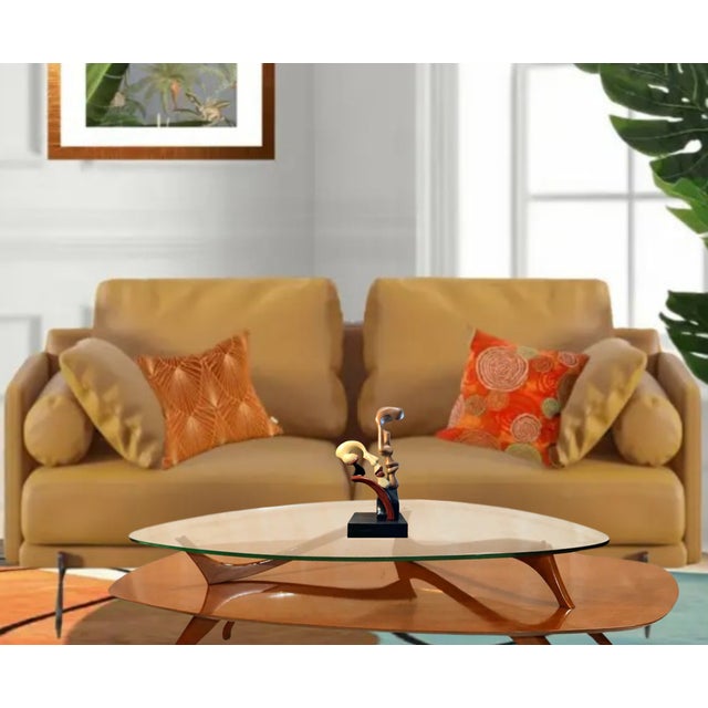 "Surrender" is a 15.5-inch-tall abstract sculpture by renowned sculptor Alexsander Danel for Austin Productions, capturing...