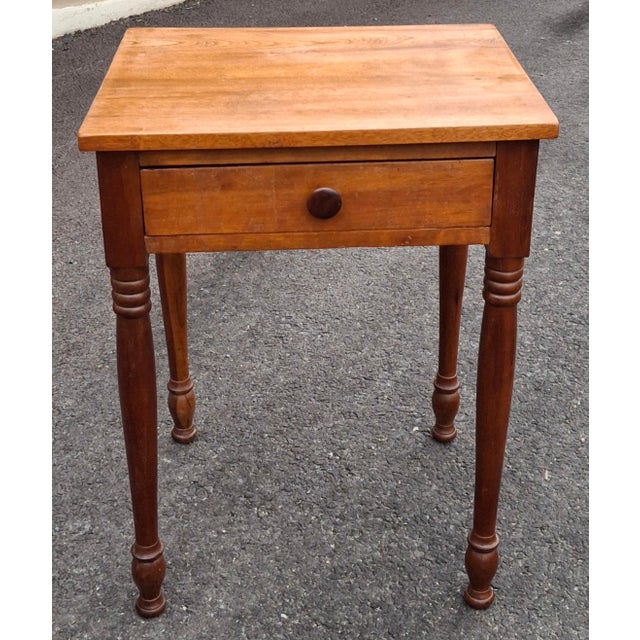 Early American Stylevhand Crafted Mixed Fruitwood single drawer Work Table from the early 20th century. Measures 20" in...