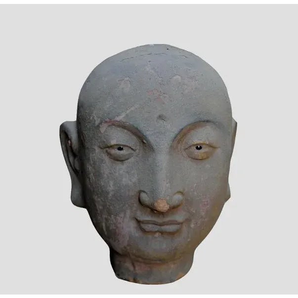 This Luohan head from 1886 was hand made of clay. There is some minor peeling. But overall it is in great condition....