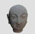 This Luohan head from 1886 was hand made of clay. There is some minor peeling. But overall it is in great condition....