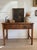 A quietly handsome 19th-century table or small desk with a straightforward, workmanlike form that leans distinctly English...