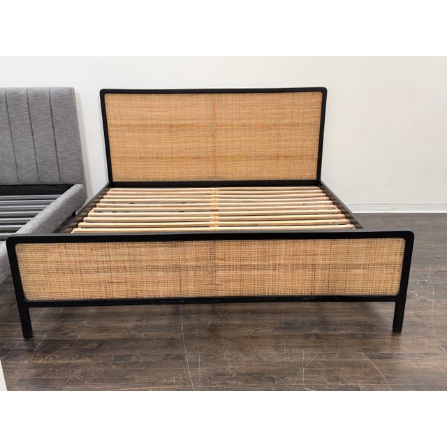 Design Plus Gallery presents the Eastern King Size Ida Woven Bed Frame by Williams Sonoma for West Elm. The black finish...