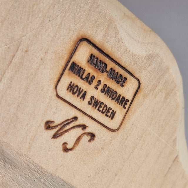 A hand-carved wood table lamp by Swedish folk artist Sven-Göran Niklasson, working under the name Niklas 2 Snidare in...