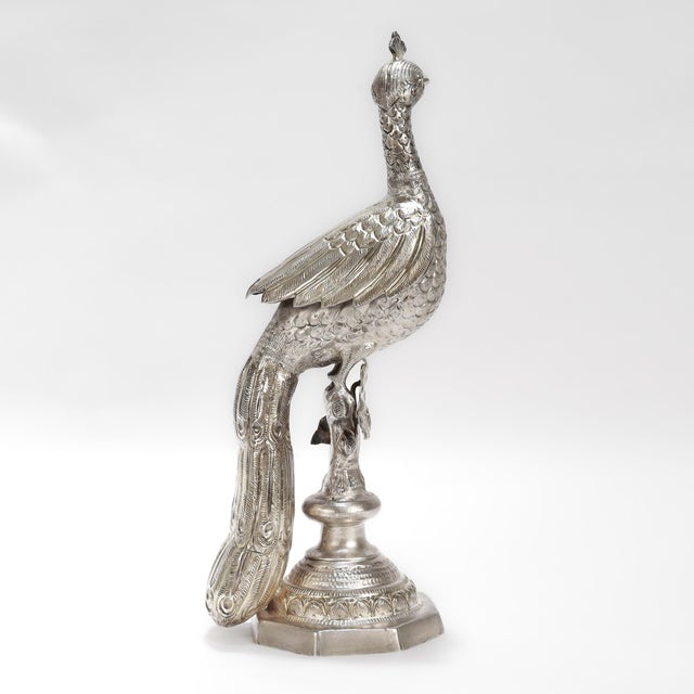 A fine antique figural silver rose water sprinkler. Likely Kutch Indian or Ottoman. In solid silver. In the form of a...