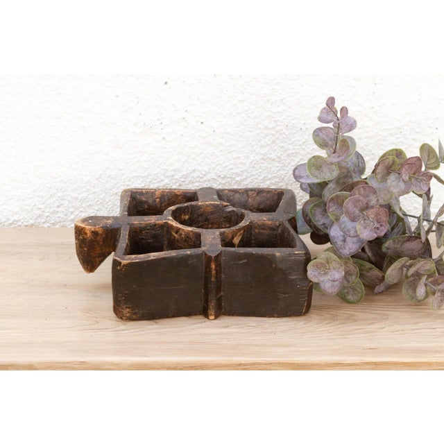 This antique wooden spice tray is a testament to honest craftsmanship and a life of purpose. A charming Indian piece from...
