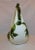 Hull Pottery Tokay Moon vase with white background and green applied grape and vine decoration
